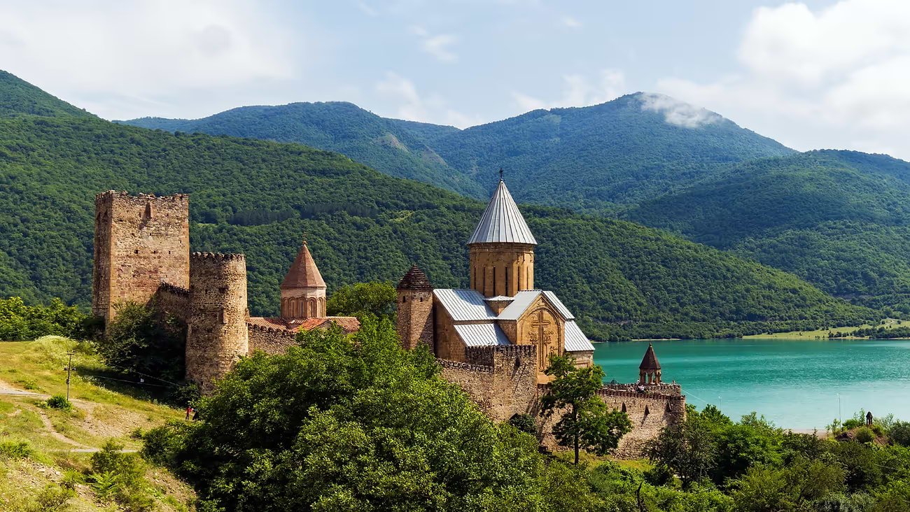 An ancient castle in Georgia with sea and mountain views