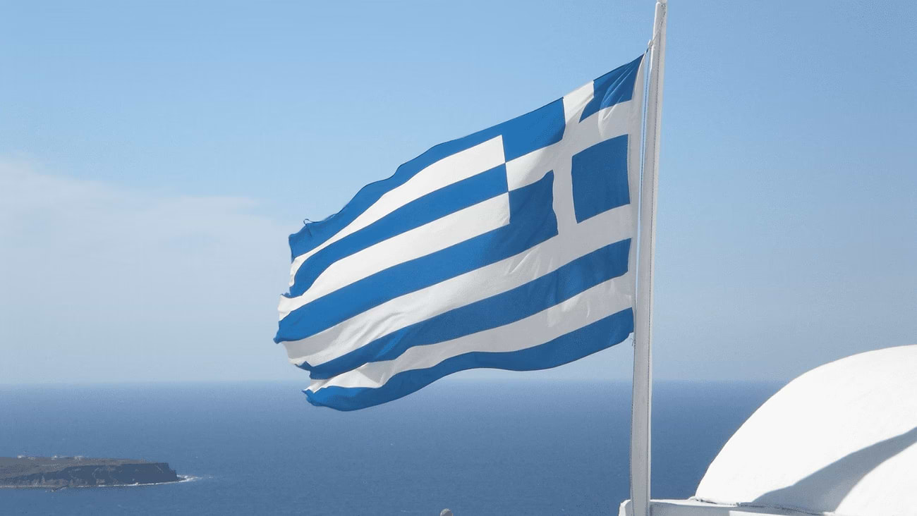 Greek flag on the background of the sea